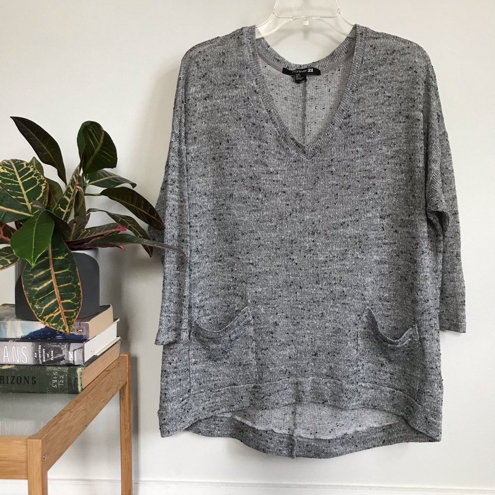 Button back semi-sheer sweater